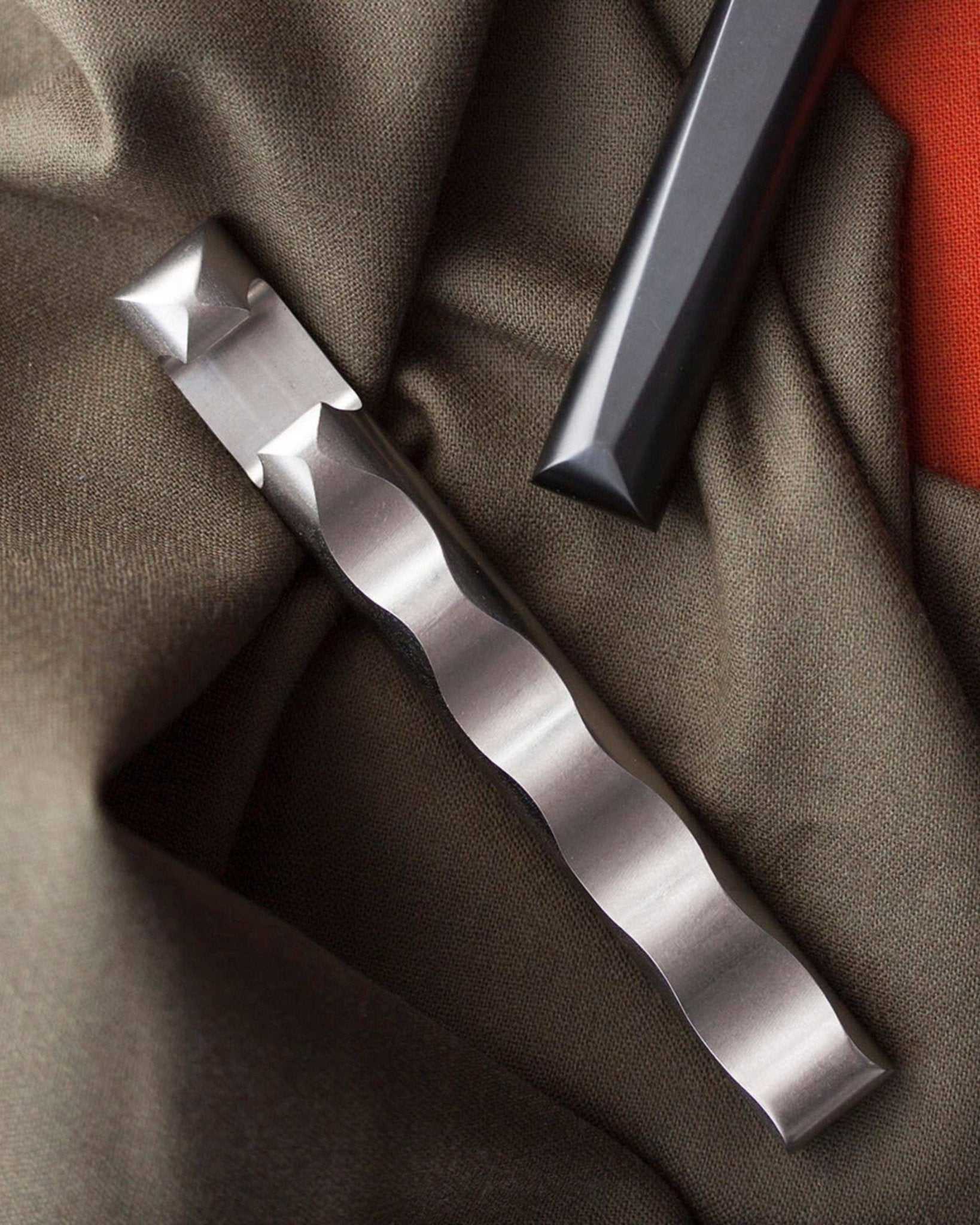 Ripple Opener: Brass