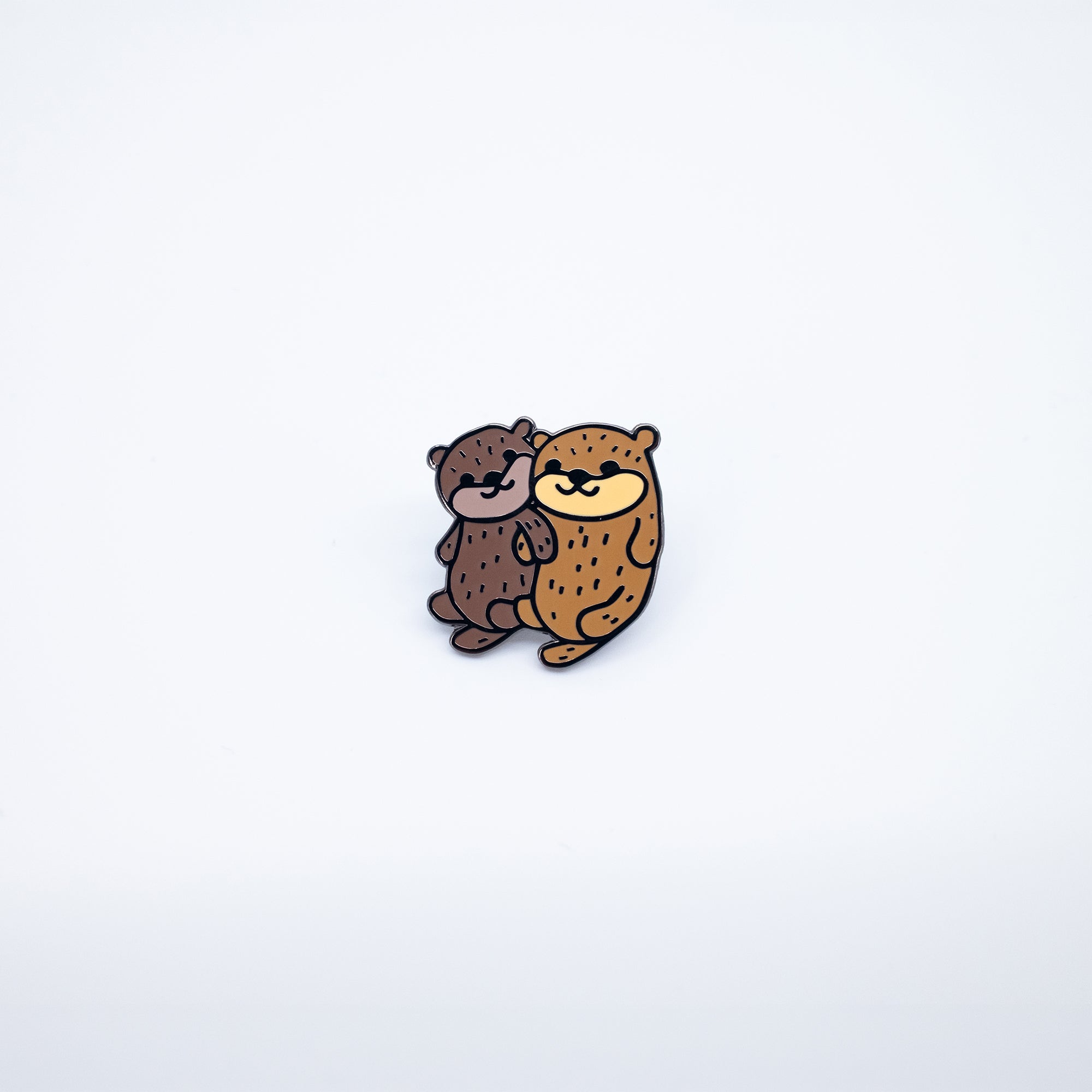 Holding Hands Otters Pin